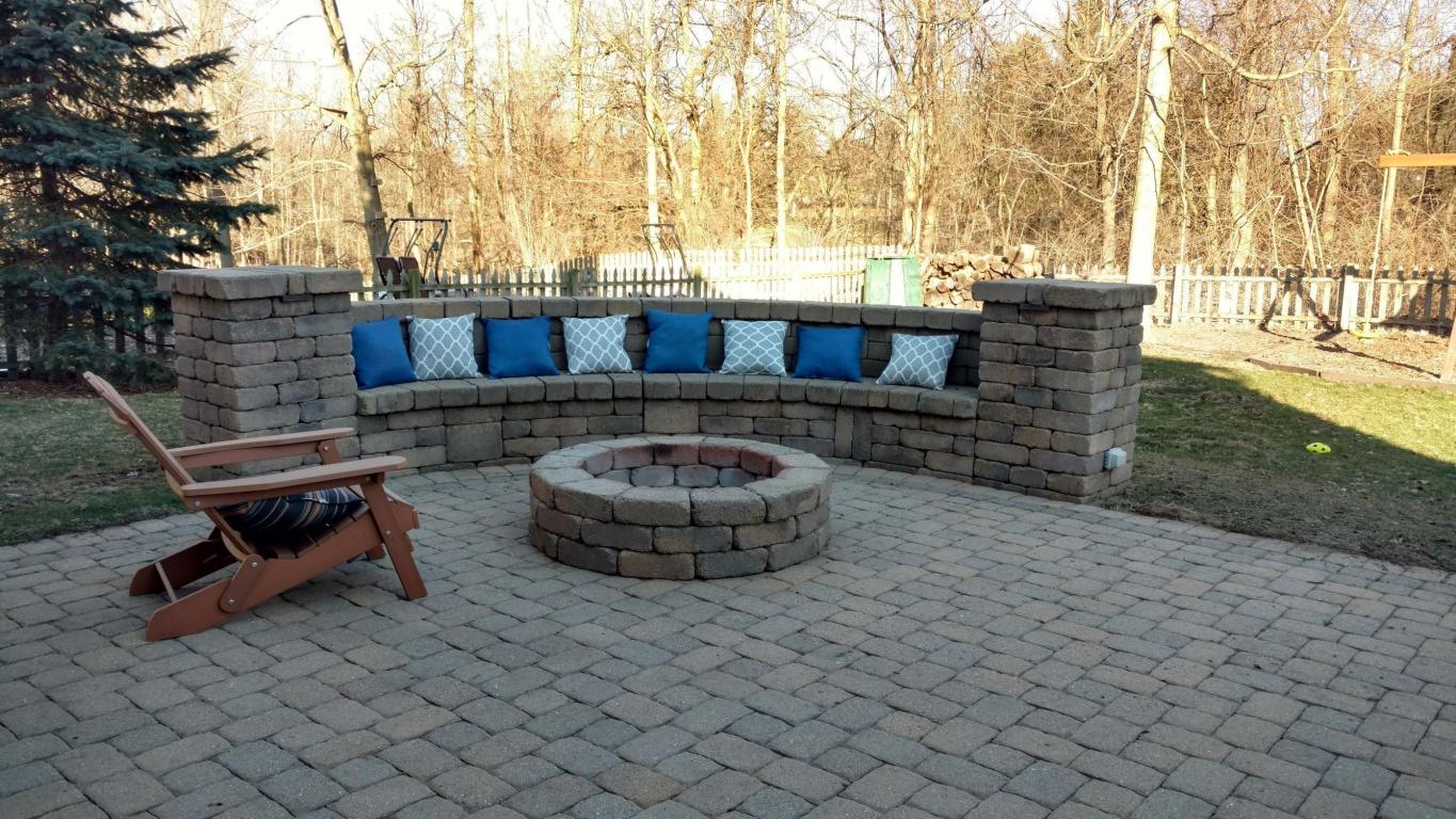 Custom pavers patio with firepit and seating at 7658 Pinehill Rd, Lewis Center, OH
